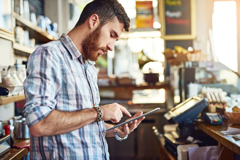 Man working on tablet computer