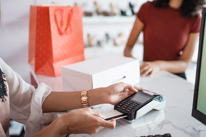 Boutique accepting payments with a credit card chip reader.