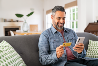 Man making an online purchase using his phone